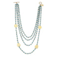 3151TQ GOLD AND TURQ 4 STRAND NECKLACE WITH HANDCAST OVAL