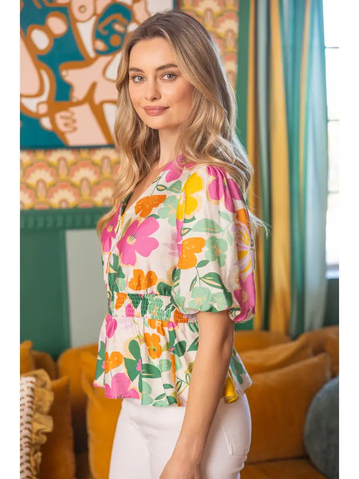 36477 Half Zip V-Neck Floral Peplum Top