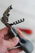 CORKSCREW- TRIANGLE WORM- GRAY SILICONE HANDLE