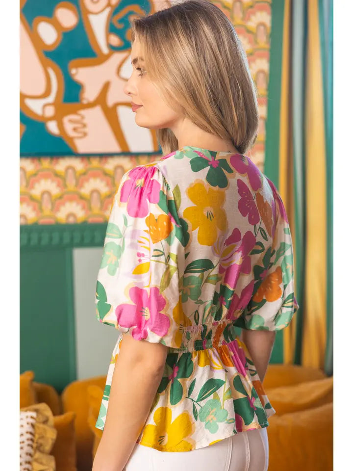 36477 Half Zip V-Neck Floral Peplum Top